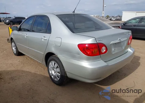 2004 Toyota Corolla Le z USA, uszkodzony, nr VIN JTDBR32E642043194